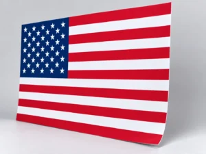 Close-up of the thin unframed paper edge of an American Flag poster